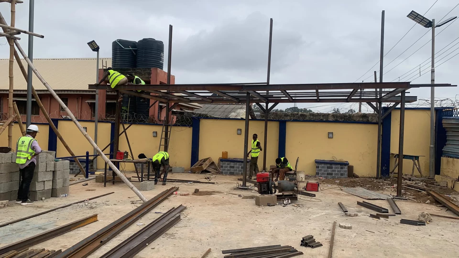 Handover day on the artificial-turf pitch at the University of Ibadan