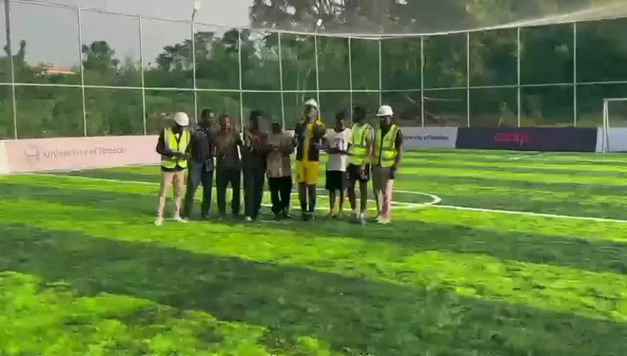 Walking the finished pitch with the client before kickoff